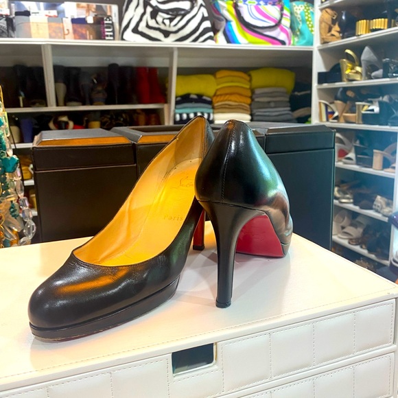 Christian Louboutin black leather pumps. Size 9… Good condition
